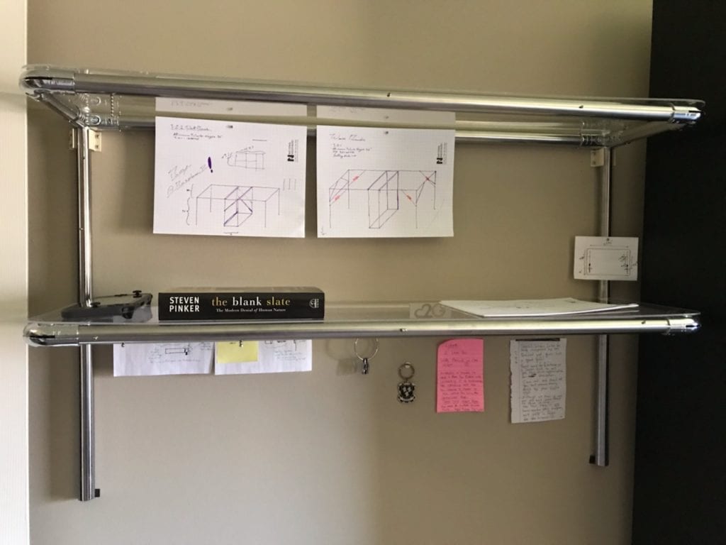 optional shelf unit that can either be fixed to the wall or to the desk