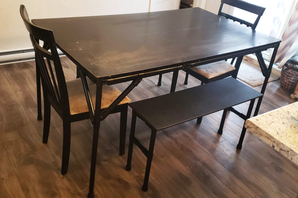 DIY table with black pipes and fittings