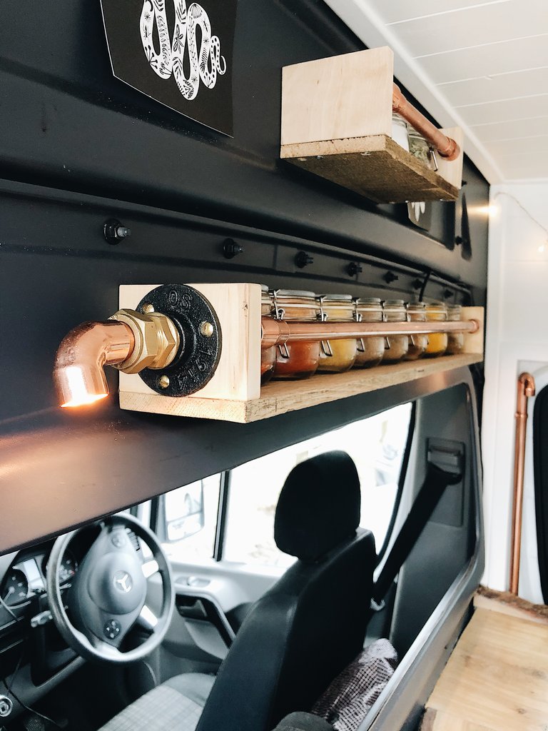 This image shows a DIY van spice rack.